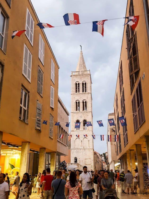 Passers-by walking through the streets of Zadar